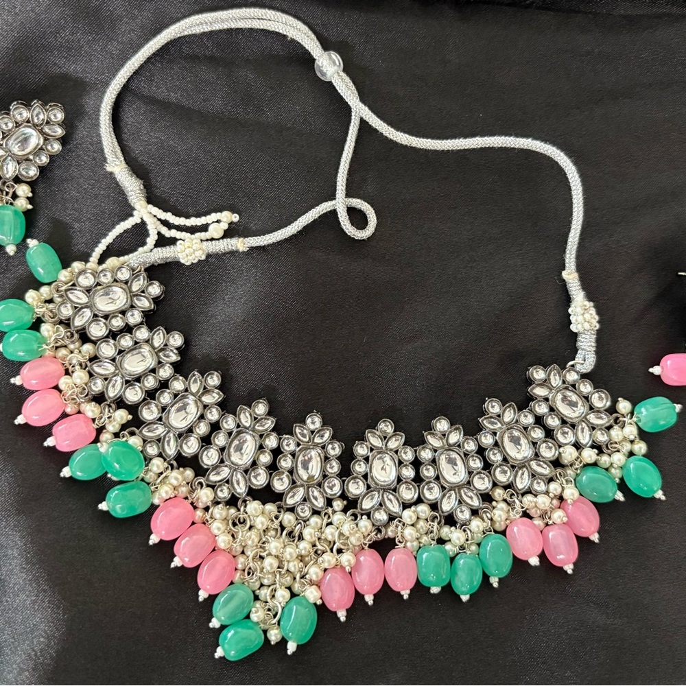 Beautiful Black and white kundan set with pastel green and pink monalisa
